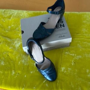 Never worn black leather Clarks shoes, made for comfort.